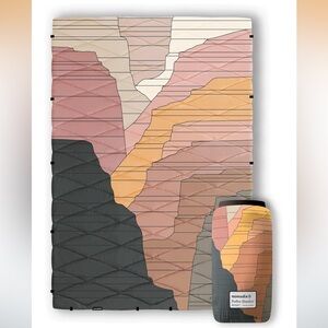 Nomadix Grand Canyon puffer blanket 74” x 55”